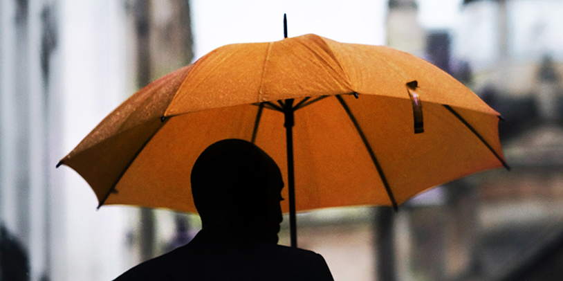 Orange Umbrella walking