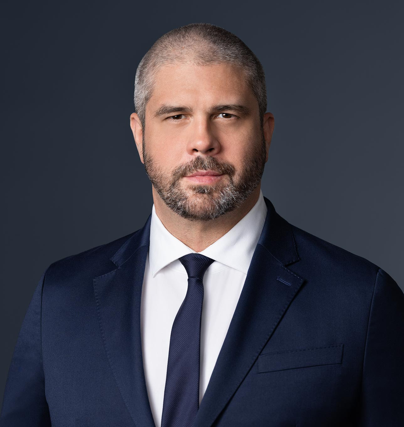 Headshot of Adam Holmes
