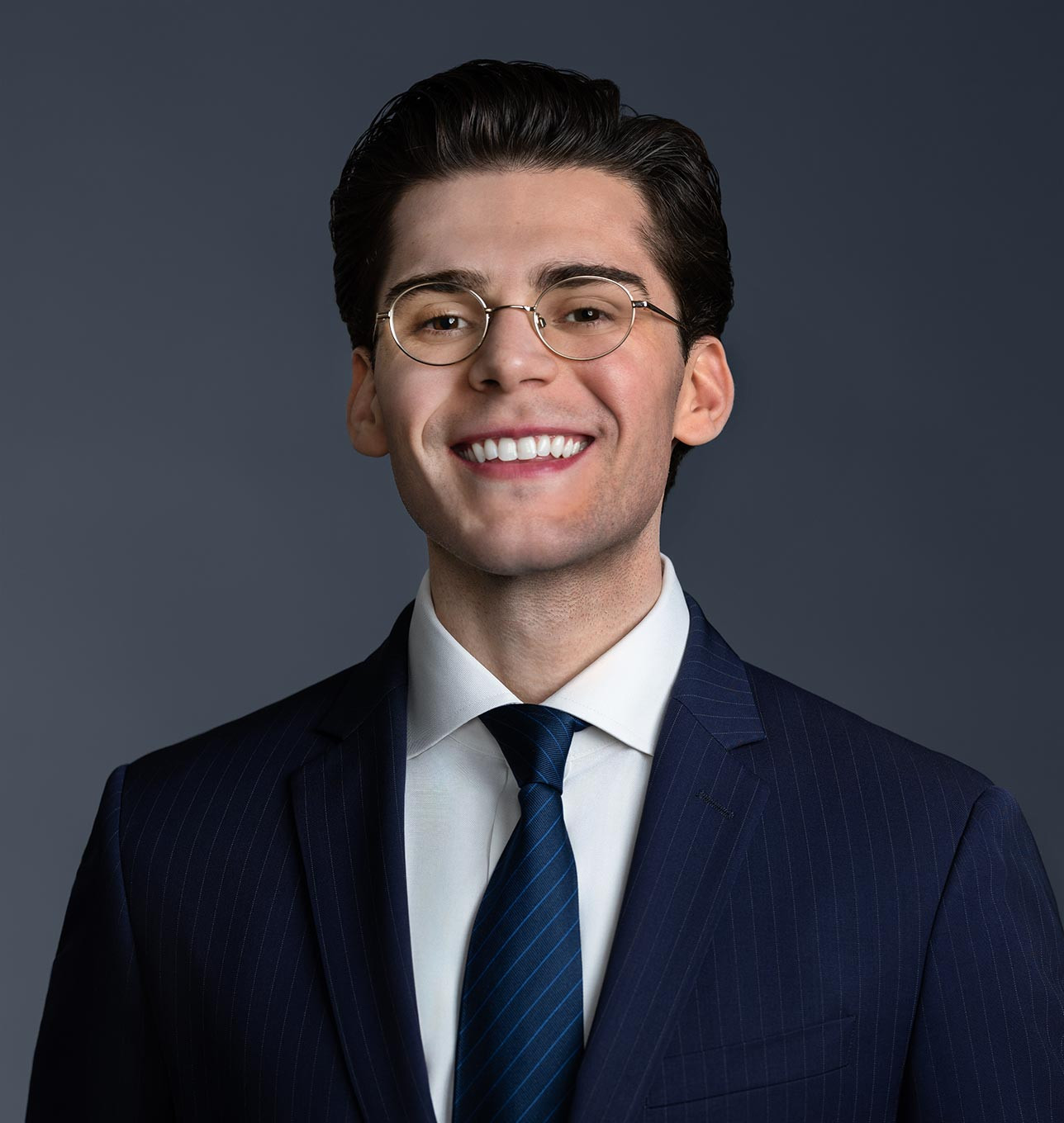 Headshot of William Ladas